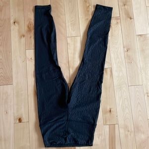Like new lululemon align tights size 4. 25” length. Black with a black print.